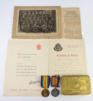 A World War One pair of medals to no.92325 DVR.J.V.Bartlett.R.E. together with a Queen Mary 1914 Christmas tin, photograph, homeguard certificates and newspaper obituary 
