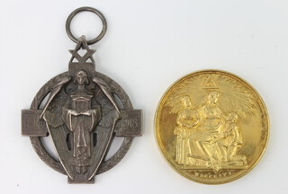 A silver Masonic jewel and a gilt ditto 