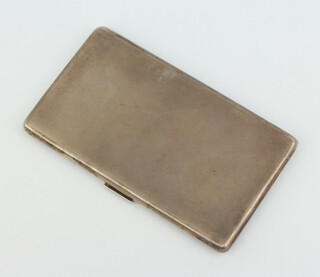 A silver engine turned cigarette case, Chester 1958, 222 grams 