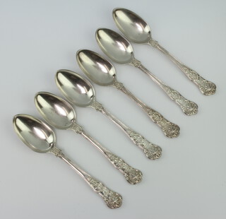 A set of 6 William IV Kings pattern dessert spoons with chased monogram 410 grams