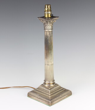 A silver Corinthian column table lamp with stepped base, engraved presentation inscription, Sheffield 1914, maker Hawksworth, Eyre & Co, 36cm 