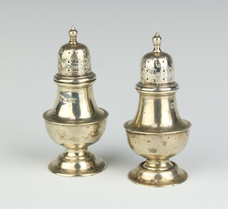 A pair of Victorian silver pepperettes Sheffield 1898 8.5cm h, 67 grams