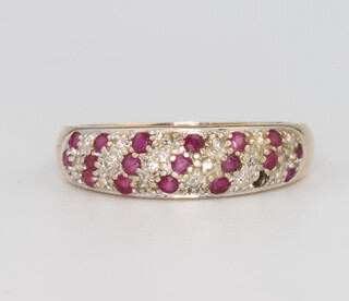 A 9ct yellow gold ruby and diamond ring 2.7 grams, size P