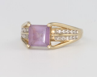 A 9ct yellow gold amethyst and diamond ring, 4 grams, size N 