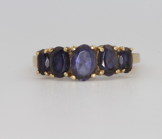 A 9ct yellow gold blue gem set ring 2.7 grams, size H 