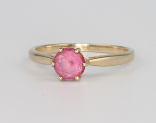 A 9ct yellow gold pink gem set ring 2 grams, size P 