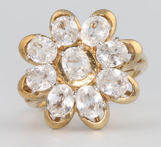 A 9ct yellow gold paste set floral ring, size N, 6.5 grams