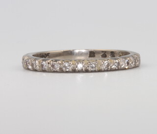 An 18ct white gold diamond half eternity ring 3.3 grams, size Q 1/2