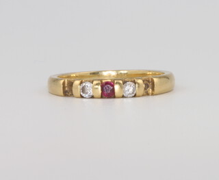 An 18ct yellow gold ruby and diamond ring 2.5 grams, size J (2 rubies are missing) 