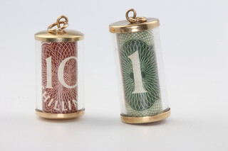 Two 9ct yellow gold bank note charms 