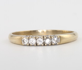 A 9ct yellow gold 5 stone diamond ring, 2 grams, size R