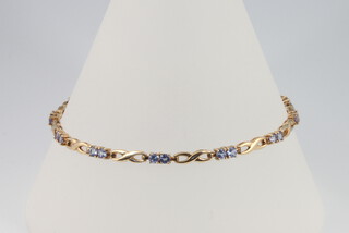 A 9ct yellow gold gem set necklace, 19cm, 5.4 grams