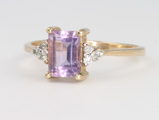 A 9ct yellow gold amethyst and diamond ring, size N, 1.7 grams 