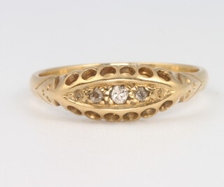 An 18ct yellow gold diamond ring, size O, 2.8 grams