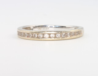 An 18ct white gold diamond half eternity ring, 2 grams, size N 