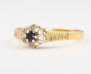 An 18ct yellow gold sapphire and diamond cluster ring, 3.1 grams, size S 1/2