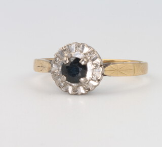 An 18ct yellow gold sapphire and diamond cluster ring, 2.6 grams