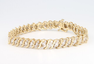 A 9ct yellow gold diamond bracelet, 17.6 grams, 18cm 