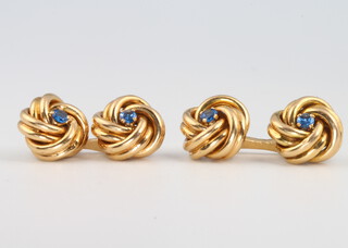 A pair of 18ct yellow gold whorl and sapphire cufflinks 6.2 grams 