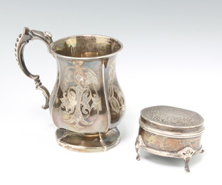 A Victorian silver baluster christening mug with S scroll handle, Birmingham 1865, 60 grams together with an Edwardian silver oval trinket box raised on cabriole legs