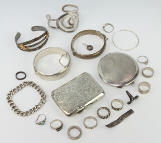 A silver bangle and minor silver jewellery, 328 grams 