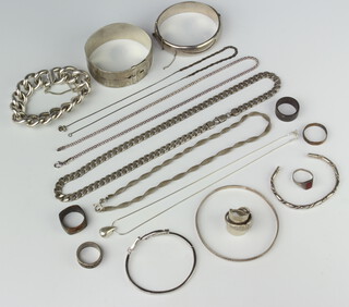 An engraved silver bangle and a quantity of silver jewellery, 268 grams