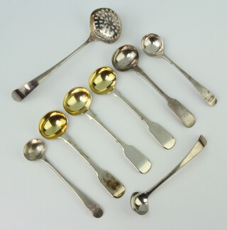 A Georgian silver sifter spoon and minor mustard spoons, mixed dates, 88 grams 