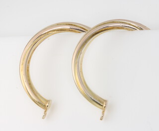A pair of 9ct yellow gold hoop earrings