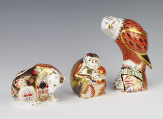 A Royal Crown Derby Imari pattern paperweight of a red kite with gold stopper 20cm, ditto chimpanzee and chip with silver stopper 10cm and a polar bear with silver stopper 8cm 