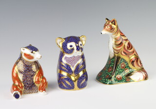 A Royal Crown Derby Imari pattern paperweight of a vixen with gold stopper 15cm, ditto seated bear silver stopper 10cm and a koala bear (no stopper, second) 11cm 