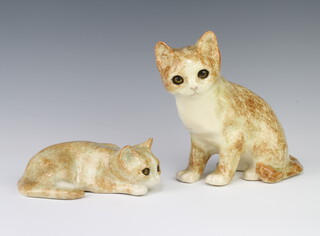 A Jenny Winstanley reclining cat with glass eyes 17cm, ditto seated cat 20cm 