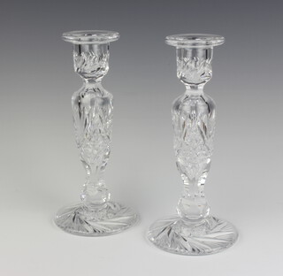 A pair of cut glass candlesticks 22cm 