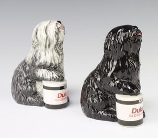 A Royal Doulton Dulux dog dated 2011, black 14cm and one other in white 