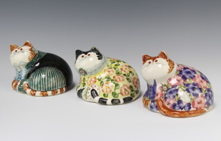 Three Rye Cinque Port Pottery figures of reclining dressed cats with glass eyes 10cm  