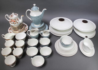A 22 piece Royal Doulton Reflections patterned coffee service comprising coffee pot, twin handled plate, cream jug, milk jug, sugar bowl, large sugar bowl, 6 tea plates, 5 cups and saucers, a 22 piece Morning Star dinner service - oval platter, 6 dinner plates, 5 side plates, 6 tea plates, sauce boat and stand (all with contact marks) and a 21 piece Coalclough Derby style tea service - twin handled plate, teapot, milk jug, sugar bowl (cracked), 6 tea plates, 6 saucers and 5 cups (all with contact marks and rubbing to the gilding) 