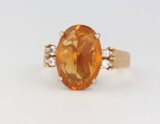 A 14ct yellow gold citrine and diamond ring size M