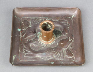 A Newlyn style square embossed copper chamber stick decorated dolphins 4cm x 14cm x 14cm 