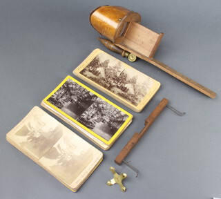 A 19th Century stereoscopic viewer together with a collection of cards comprising 6 by Twiss & Sons, 5 by Griffin and Griffin, 2 The Universal Stereoscope View Company, 2 The Universal Photo Art Company, 2 Underwood and Underwood, 1 The Stereoscope View Company and 6 unmarked cards 