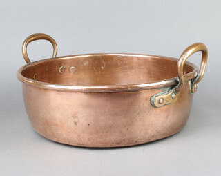 A 19th Century circular copper twin handled preserving pan 10cm h x 33cm diam. 