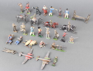 A collection of Timpo and Britains lead figures including a machine gunner, cavalryman, bedouin, frogman etc 
