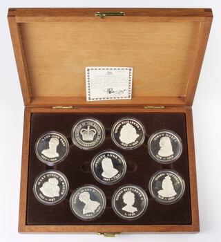 A set of 9 Birmingham Mint commemorative 1977 silver medallions, 396 grams, cased