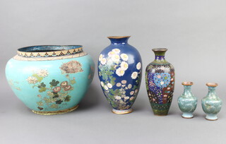 A 19th Century turquoise and floral patterned cloisonne enamelled jardiniere 28cm h x 27cm, a ditto black ground enamelled vase decorated chrysanthemums 31cm x 8cm, a black ground ditto 26cm and a pair of green ground enamelled vases 13cm 