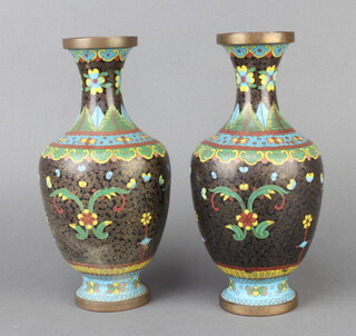 A pair of cloisonne black ground and floral patterned club shaped vases 23cm x 7cm  