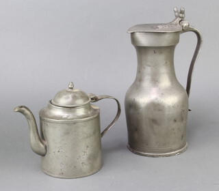 A 17th/18th Century Continental pewter lidded jug with acorn thumb piece, old repair, marked MC and some dents to the body 25cm x 11cm together with an 18th/19th Century Continental cylindrical pewter coffee/teapot 15cm x 12cm 