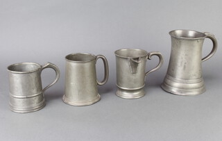 A Victorian waisted pewter quart measure marked J McGalashank & Co Glasgow, a Victorian spouted pewter pint measure base marked G H Hooker (spout possibly repaired), a Victorian pewter pint tankard, a James Walker pewter tankard marked Lots Road Power House River Tunnels 1929 