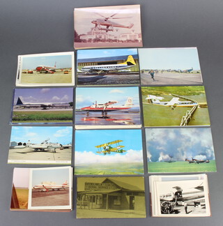 A collection of black and white and coloured photographs and postcards of passenger aircraft