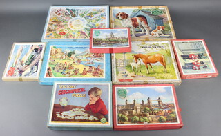Nine Victory jigsaw puzzles - Flower Calendar no.FC1, St Bernard with puppy by kennel, Domestic Animal Series DAS/S, Horse and foal, Indian Wood IND1, Europe M2, Tower of London LV, Buckingham Palace TP1, Steam Train by Coast TPI and London Series St Paul's Cathedral from the Thames L.V/S 