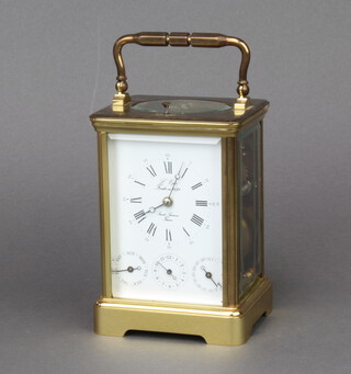 L'Epee Fonde, a 20th Century French 8 day striking on gong carriage clock, the enamelled dial with calendar dial, date dial and month dial, marked L'Epee Fonde En 1839 Sainte Suzanne France, the back plate signed with crossed swords mark and Made in France, complete with key and guarantee dated 7/05/88 