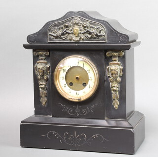 A French 19th Century striking mantel clock with enamelled dial and Roman numerals contained in a black marble architectural case (minute hand and pendulum are missing) 