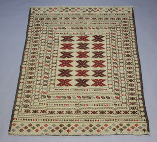 A white and red ground Sumak Kilim with 3 rows of 6 stylised diamonds to the centre 175cm x 129cm 